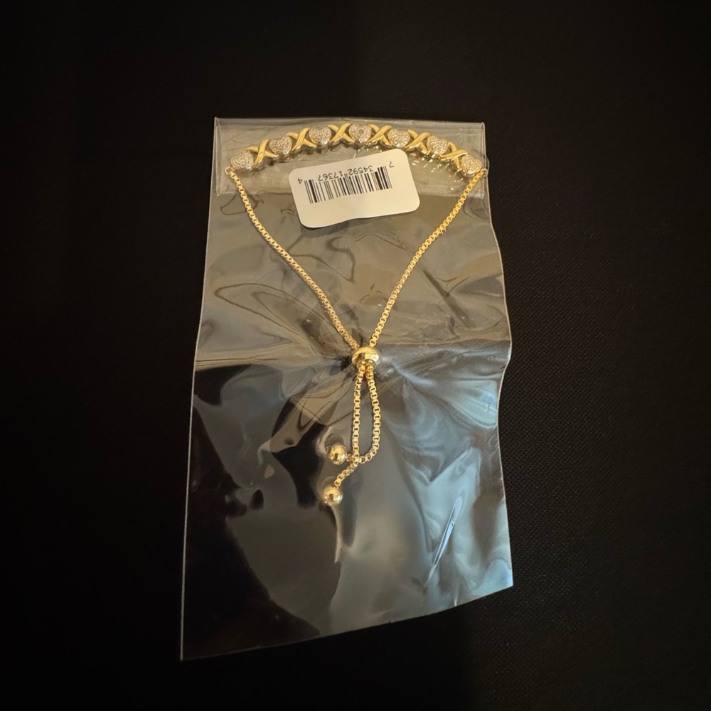 Slider adjustable gold bracelet with silver hearts